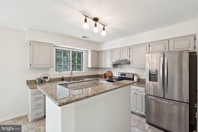 14724 Flower Hill Dr, Centreville, VA 20120 - kitchen featuring a sink, stainless steel appliances, visible vents, light stone countertops, and under cabinet range hood