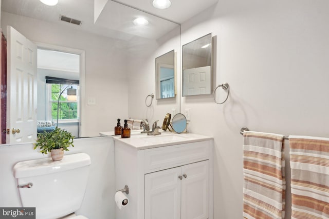 14724 Flower Hill Dr, Centreville, VA 20120 - bathroom with toilet, vanity, and visible vents