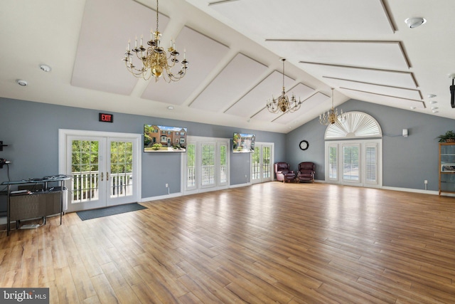14724 Flower Hill Dr, Centreville, VA 20120 - unfurnished living room featuring a wealth of natural light, a chandelier, and french doors