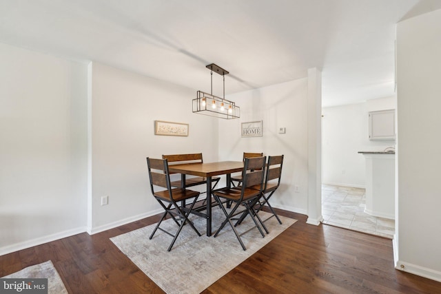 14724 Flower Hill Dr, Centreville, VA 20120 - dining area with baseboards and wood finished floors