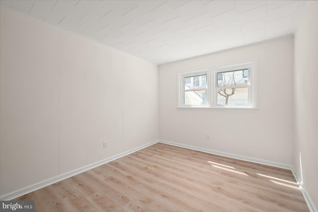 12505 Assawoman Dr, Ocean City, MD 21842 - empty room featuring light wood-type flooring and baseboards