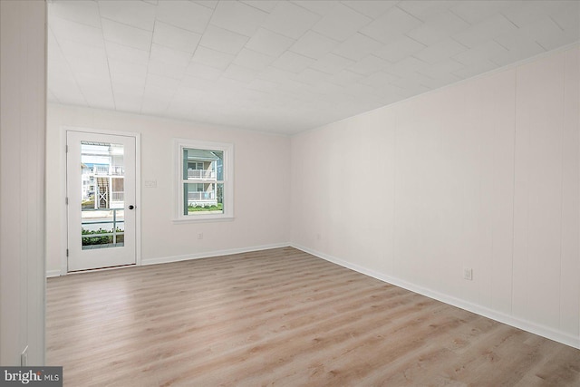 12505 Assawoman Dr, Ocean City, MD 21842 - unfurnished room featuring baseboards and light wood-style floors