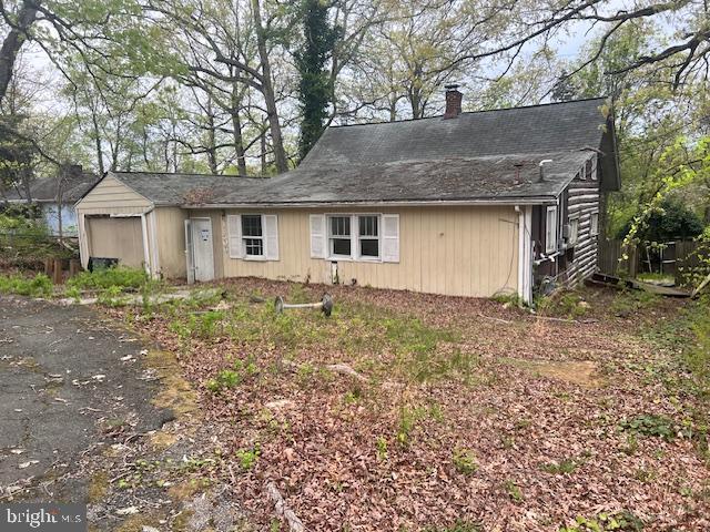 18506 Triangle St, Triangle, VA 22172 - view of front of home featuring a chimney