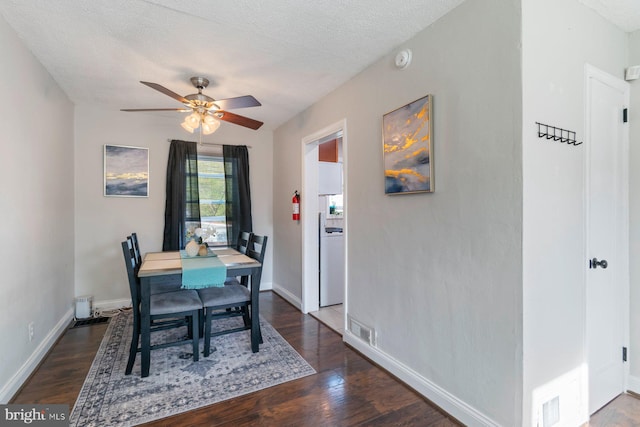 dining space with ceiling fan, baseboards, wood finished floors, and visible vents