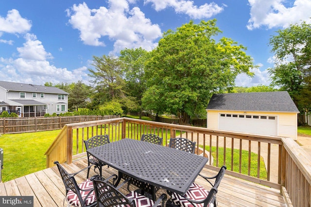 202 Stern Cv, Stafford, VA 22554 - wooden terrace with outdoor dining area, a detached garage, and an outdoor structure