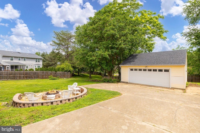 202 Stern Cv, Stafford, VA 22554 - view of yard with an outdoor fire pit, an outbuilding, and a garage