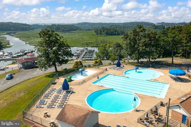 202 Stern Cv, Stafford, VA 22554 - view of swimming pool featuring a water view and a view of trees
