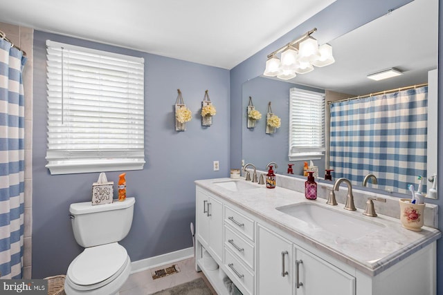 202 Stern Cv, Stafford, VA 22554 - full bath with healthy amount of natural light, toilet, tile patterned flooring, and double vanity