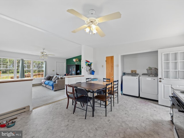 dining area with washer and dryer, ceiling fan, and a baseboard radiator