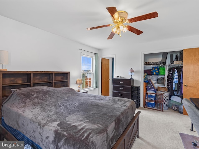 bedroom featuring ceiling fan and carpet