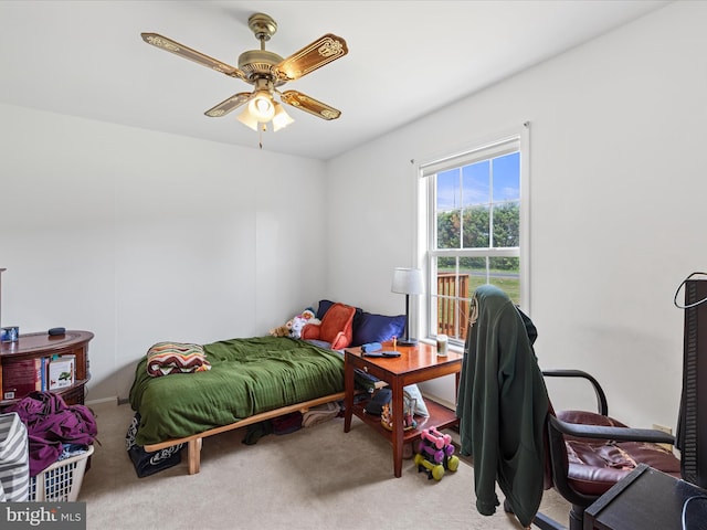 bedroom featuring carpet and a ceiling fan