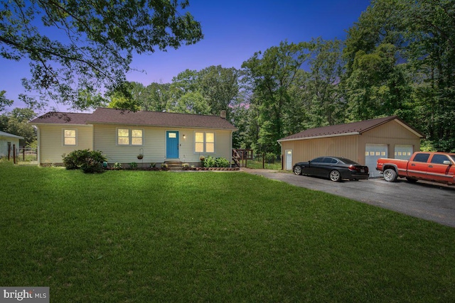 23745 Hicks Dr, Leonardtown, MD 20650 - ranch-style home featuring a detached garage, a chimney, a yard, and an outbuilding