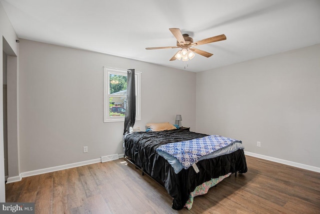 23745 Hicks Dr, Leonardtown, MD 20650 - bedroom with wood finished floors, baseboards, and a ceiling fan