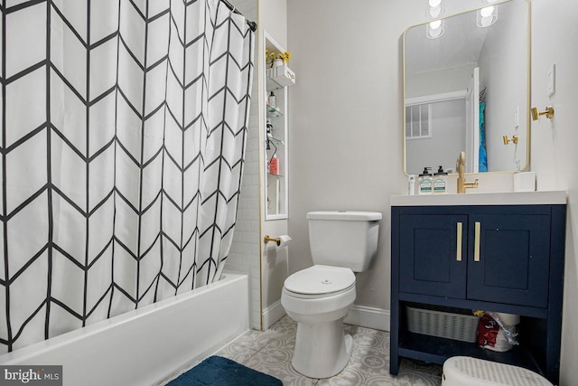 23745 Hicks Dr, Leonardtown, MD 20650 - full bath with toilet, vanity, shower / bath combo with shower curtain, baseboards, and tile patterned floors