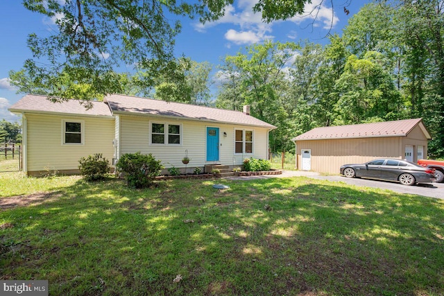 23745 Hicks Dr, Leonardtown, MD 20650 - view of front facade featuring a front yard and an outbuilding