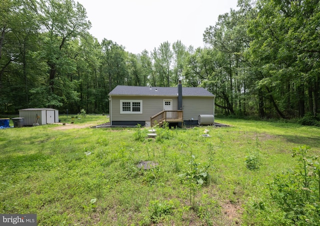 179 Mannington Yorketown Rd, Woodstown, NJ 08098 - rear view of property featuring a yard, a view of trees, and a chimney