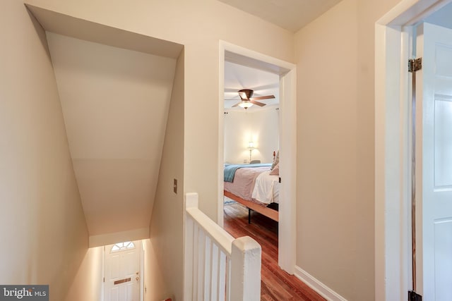 corridor with wood finished floors