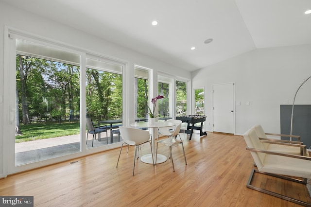 sunroom featuring a healthy amount of sunlight and visible vents