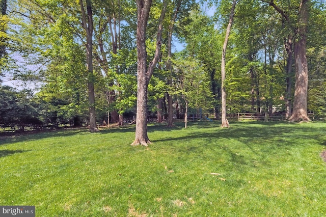 view of yard with fence