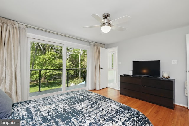 bedroom with ceiling fan and wood finished floors
