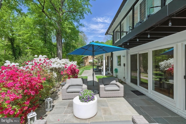 view of patio / terrace featuring a balcony