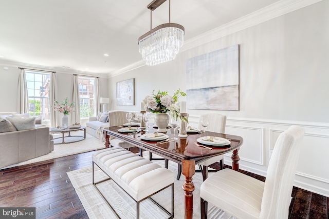 dining room featuring crown molding, wainscoting, a chandelier, recessed lighting, and dark wood-type flooring