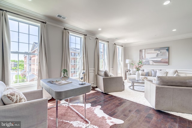 office space with recessed lighting, ornamental molding, dark wood finished floors, and visible vents