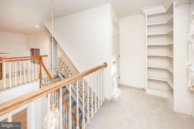 hallway featuring carpet floors and recessed lighting
