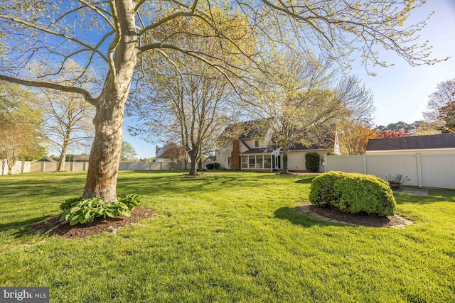 view of yard with fence