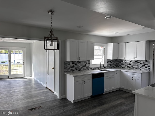 15 Excell Ln, Willingboro, NJ 08046 - kitchen with a sink, dishwasher, tasteful backsplash, dark wood-style floors, and white cabinets