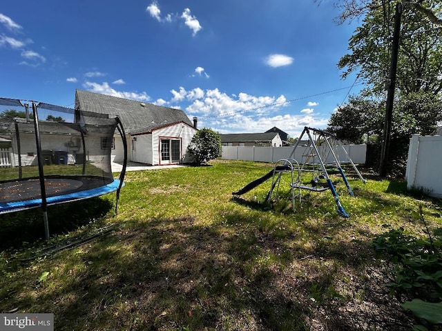 15 Excell Ln, Willingboro, NJ 08046 - view of yard with a trampoline and a playground
