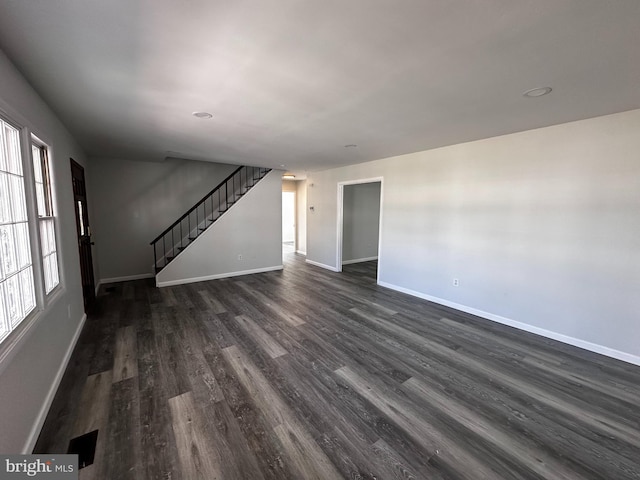 15 Excell Ln, Willingboro, NJ 08046 - unfurnished living room with baseboards, dark wood finished floors, and stairs