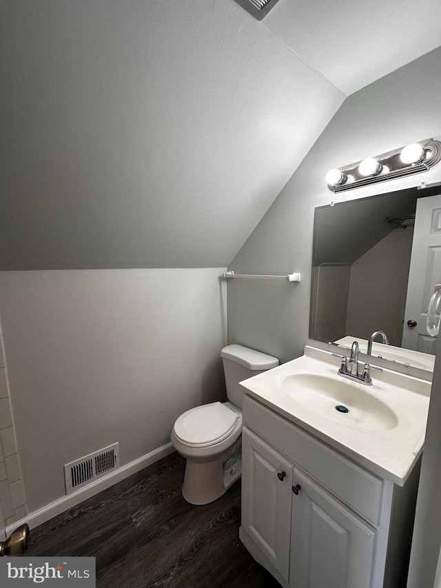 15 Excell Ln, Willingboro, NJ 08046 - bathroom with vaulted ceiling, wood finished floors, vanity, and toilet