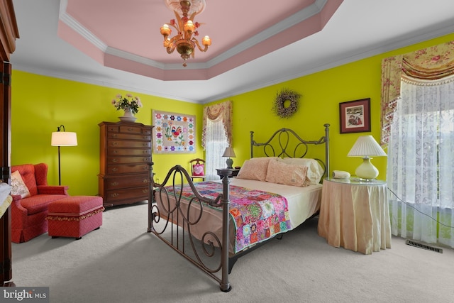 6609 Cheney Way, Gainesville, VA 20155 - carpeted bedroom with a chandelier, crown molding, and a raised ceiling