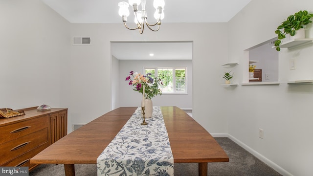 dining room featuring carpet flooring, baseboards, a chandelier, and visible vents