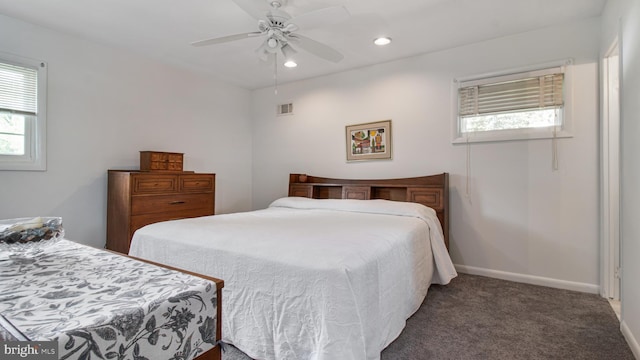 carpeted bedroom with baseboards, a ceiling fan, recessed lighting, and visible vents