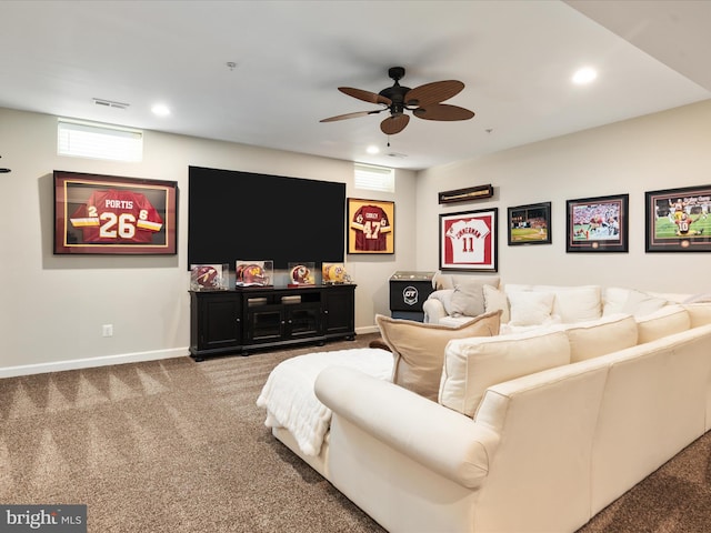 carpeted living room featuring a ceiling fan, baseboards, recessed lighting, and a healthy amount of sunlight