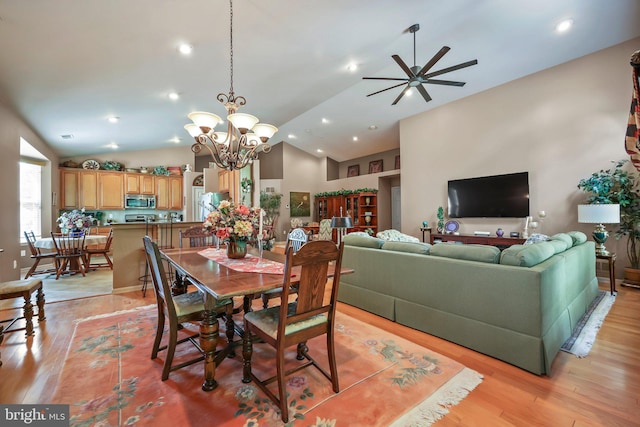 12 Citation Ln, Manalapan, NJ 07726 - dining area with lofted ceiling, ceiling fan, light wood-style flooring, a chandelier, and recessed lighting