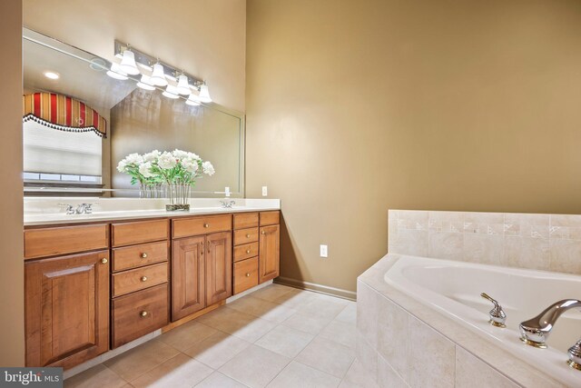 12 Citation Ln, Manalapan, NJ 07726 - bathroom featuring double vanity, tile patterned floors, a bath, and baseboards