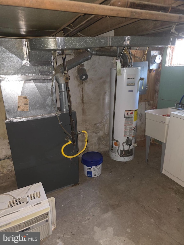 3117 Edgemont St, Philadelphia, PA 19134 - basement with water heater, heating unit, and a sink