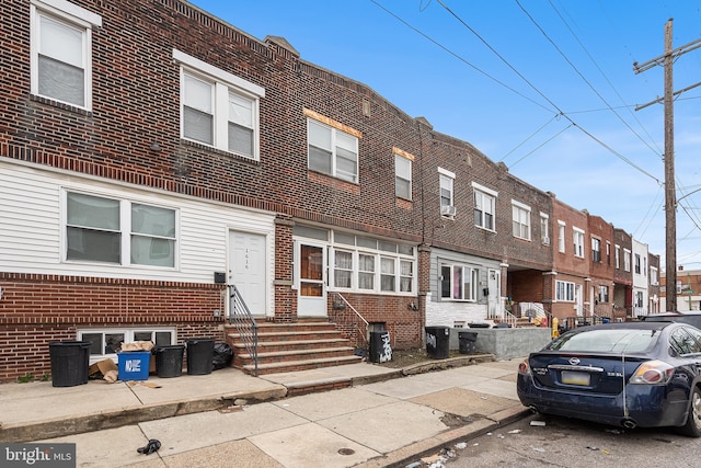 1614 S 28th St, Philadelphia, PA 19145 - townhome / multi-family property featuring brick siding, a residential view, and entry steps