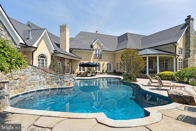 pool featuring a patio