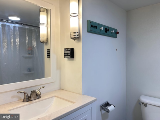 2619 Filbert Ave, Reading, PA 19606 - full bathroom featuring vanity, toilet, and a shower with curtain
