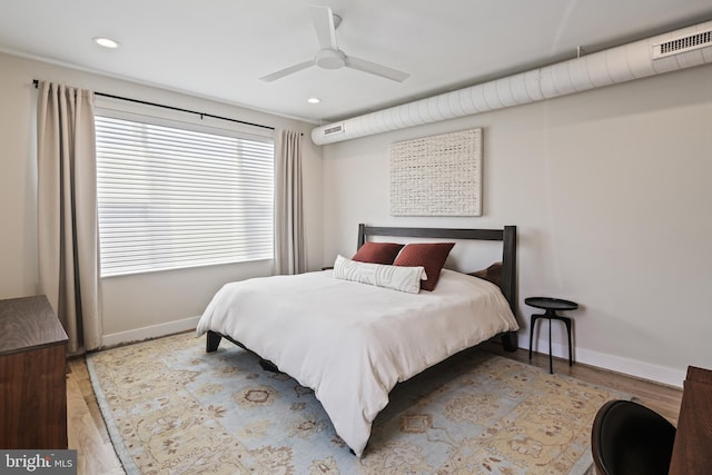 bedroom with recessed lighting, visible vents, and baseboards