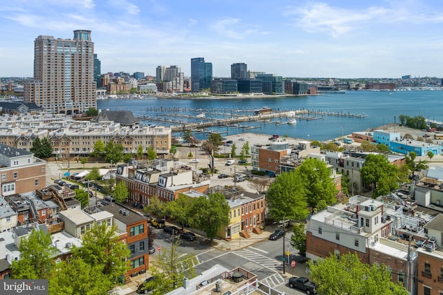 bird's eye view featuring a city view and a water view
