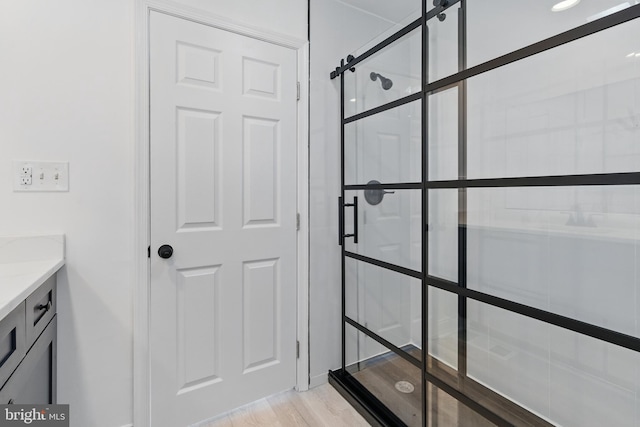 671 Pine Ridge Dr, Front Royal, VA 22630 - full bath featuring vanity, wood finished floors, and a shower stall