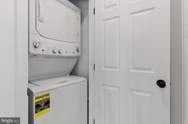 671 Pine Ridge Dr, Front Royal, VA 22630 - clothes washing area with stacked washer and clothes dryer and laundry area