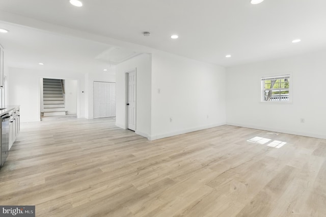 671 Pine Ridge Dr, Front Royal, VA 22630 - unfurnished room with recessed lighting, attic access, light wood finished floors, and stairway