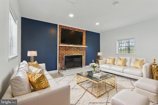 671 Pine Ridge Dr, Front Royal, VA 22630 - living room with a brick fireplace, recessed lighting, and baseboards