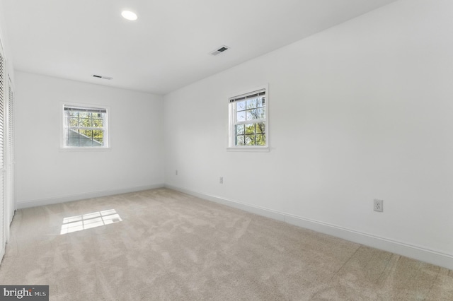 671 Pine Ridge Dr, Front Royal, VA 22630 - unfurnished room with visible vents, carpet flooring, and plenty of natural light